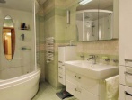 Зеленая ванная комната с мебелью Pelipal